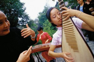 chinese girl playing music china tea shop tourists travel