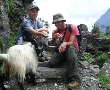 Checking out a mountain goat on a trail in China